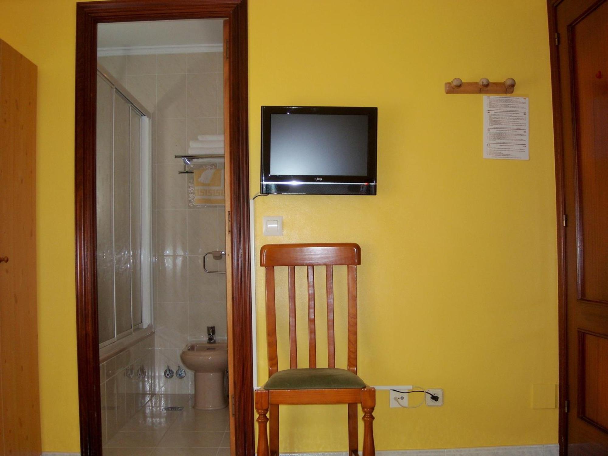 Hostal Santa Marta Playa Байона Номер фото