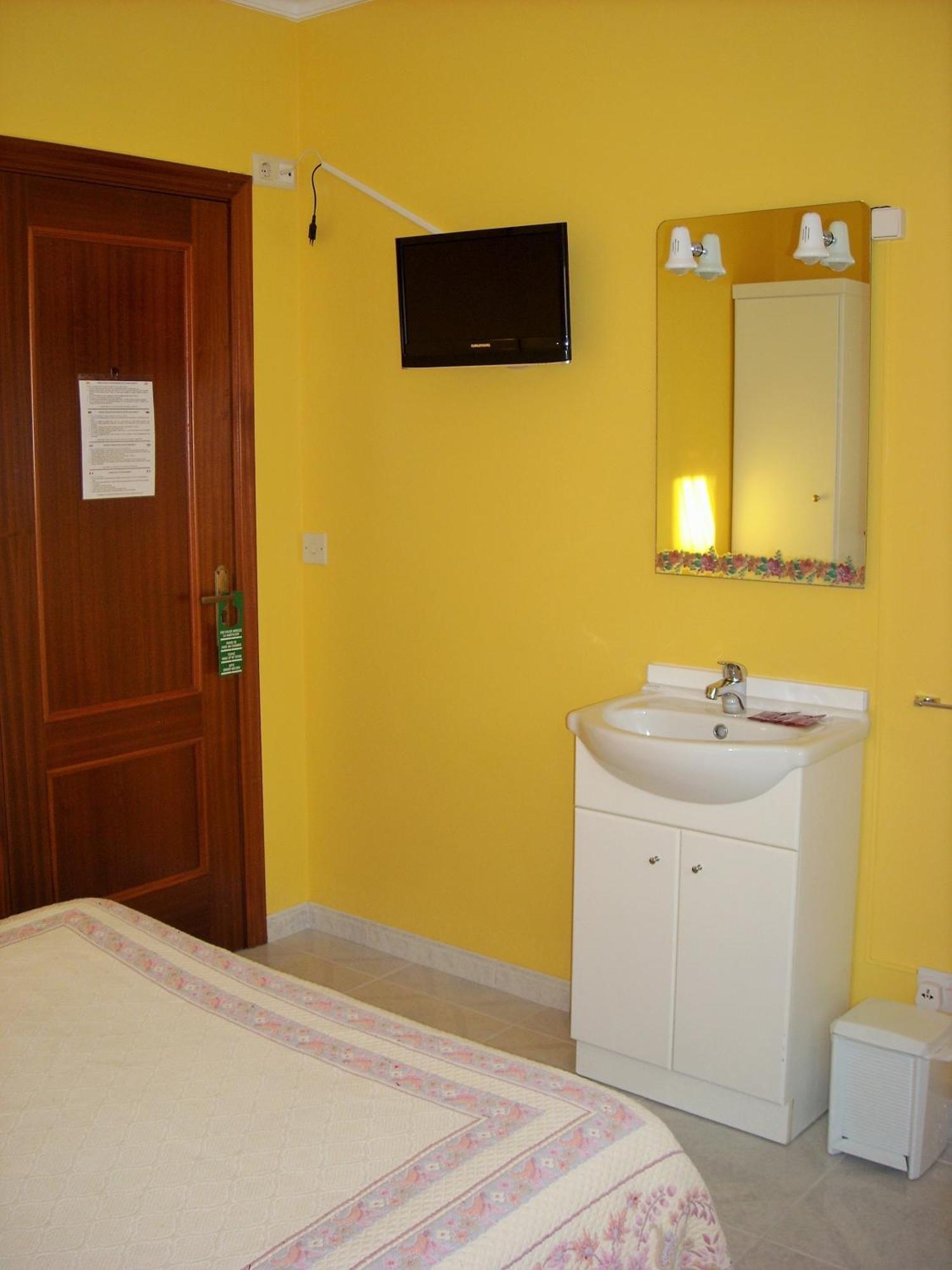 Hostal Santa Marta Playa Байона Номер фото