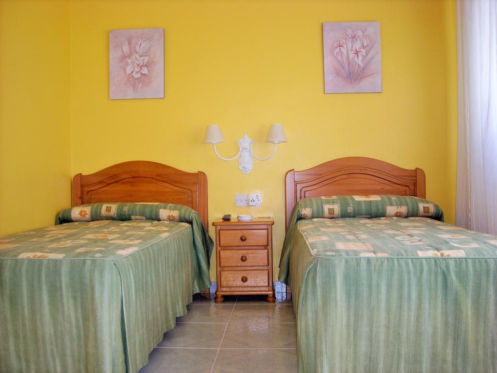 Hostal Santa Marta Playa Байона Номер фото