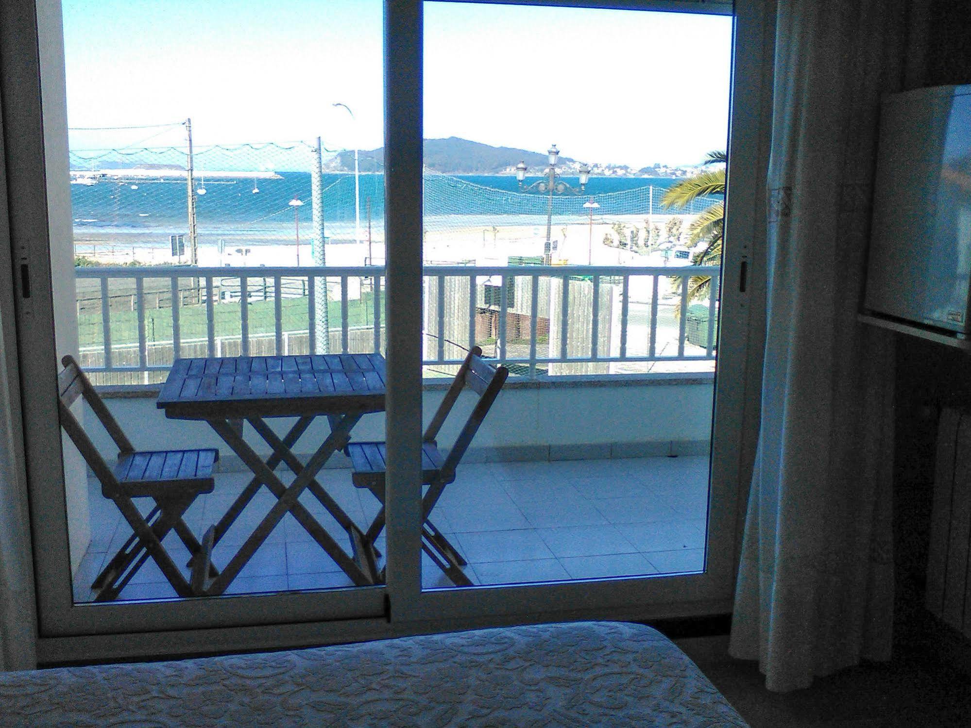 Hostal Santa Marta Playa Байона Экстерьер фото